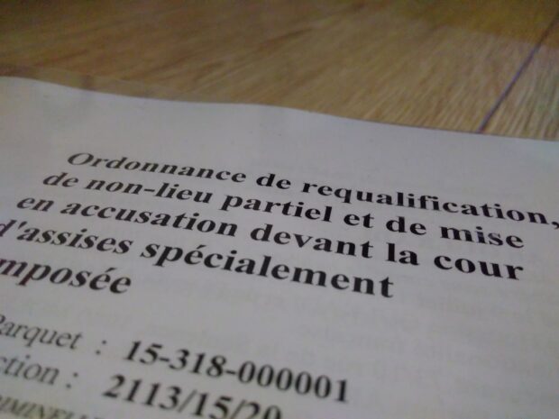 Ordonnance de requalification, de non-lieu partiel et de mise en accusation devant la cour d'assises spécialement composée. Parquet : 15-318-000001.
